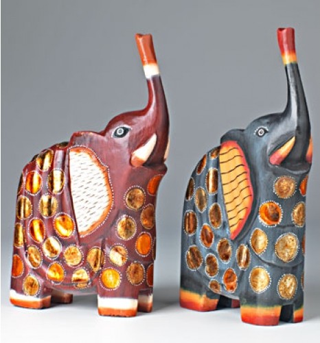 PHOTO: Two Fairtrade painted wooden elephants, hand-carved in Bali